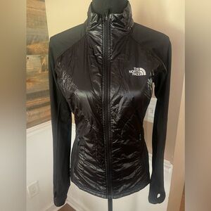 Super sleek and thin metallic like finish Northface jacket
